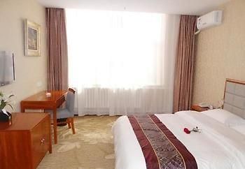 Yuangu Town Business Hotel Qingdao Bagian luar foto