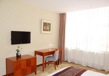 Yuangu Town Business Hotel Qingdao Bagian luar foto