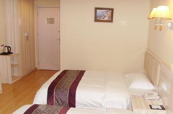 Yuangu Town Business Hotel Qingdao Bagian luar foto