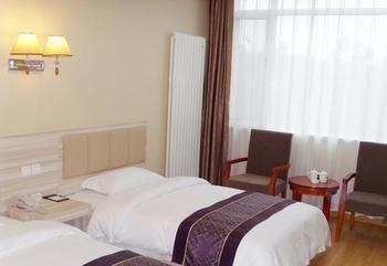 Yuangu Town Business Hotel Qingdao Bagian luar foto